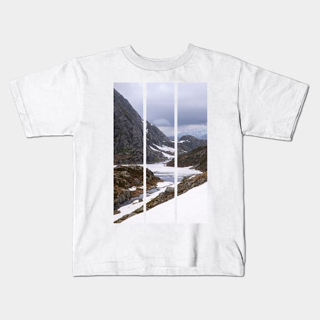 Wonderful landscapes in Norway. Vestland. Beautiful scenery on the Ryfylke scenic route. Mountains, rocks and snow in background. Cloudy day (vertical) Kids T-Shirt by fabbroni-art